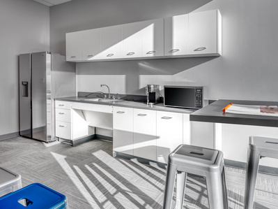 Break room cabinetry design and manufacturing for OrthoLazer franchise.