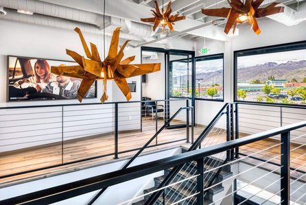 Chandeliers and framed graphic images for Indie Studio Suites.