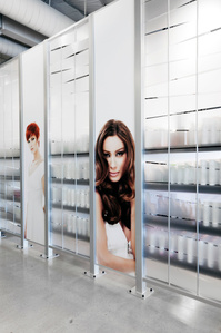 Woven acrylic wall and printed photos for Paul Mitchell the School