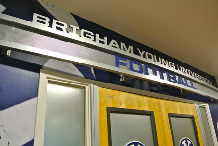 Entry signage with metal letters on metal frame 