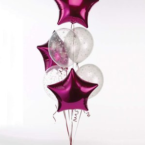 This is a pink and silver balloon display with three foil stars and four silver latex balloons.