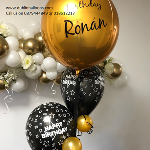 A personalised large round gold balloon with two happy birthday balloon for birthdays.