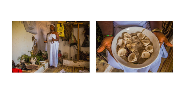 Ogbese deity in her shrine at Ara-Ekiti, Nigeria carrying Olokun divination items in her hand
