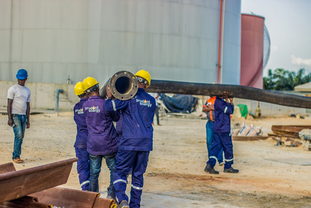 Technical staff of the depot preparing equipments needed to to offload products from the vessel. Oil and gas