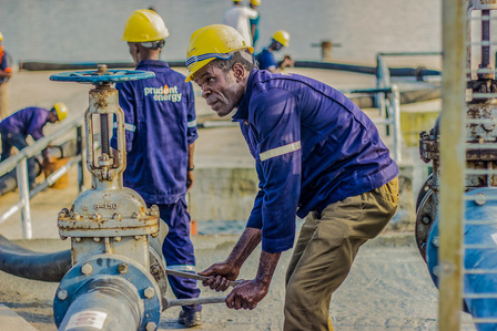 Technical staff of the depot preparing equipments needed to to offload products from the vessel. Oil and gas