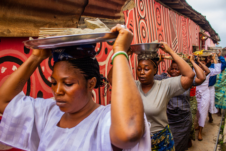 Osun devotees carry sacrificial items to the Osun River for rituals during the grand finale of the celebration of the annual Osun-Oshogbo festival. Festival Culture Tradition