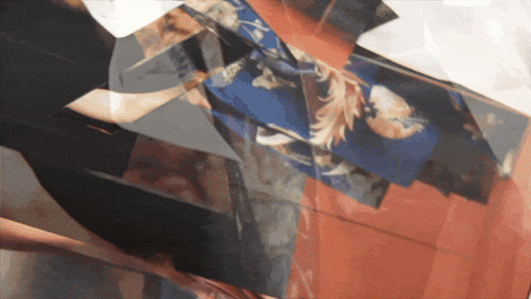 A GIF. of illustrious magazines stacked on top of one another to create motion.