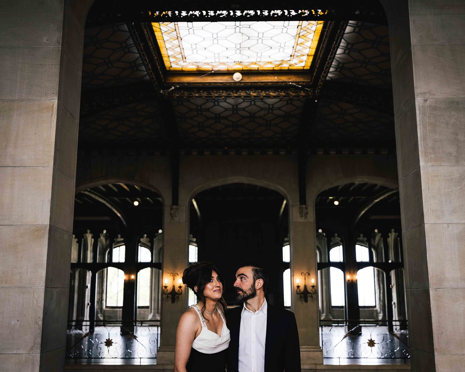 couple during an indoor engagement session in New York City, done by mc3 photo