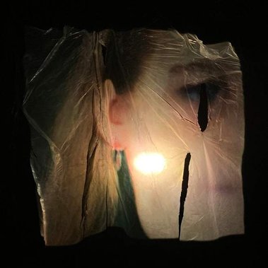 Image of Alina zum Hebel for Computer vision art gallery 2021 by Ryan Blackwell and Aleksi halttunen. The project is a machine learning video art projection onto polythene plastic. 
