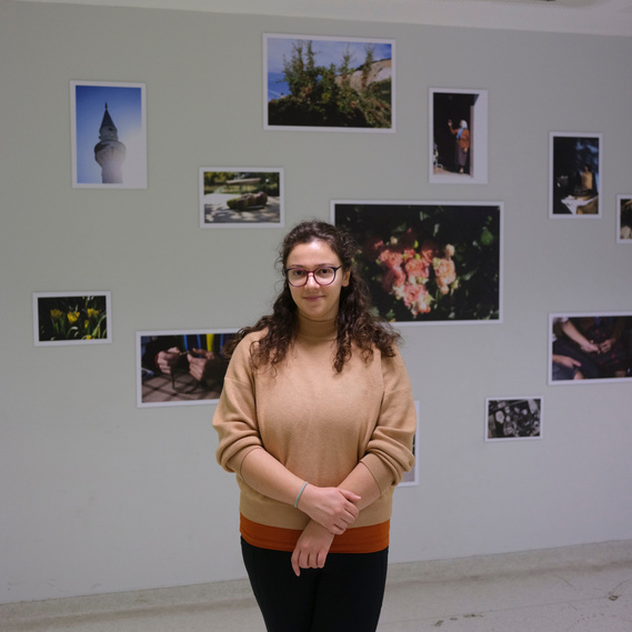 Portrait of Vera Hadzhiyska in front of her exhibition at Bursa Photo Fest 2022. Photo by Vladimir Zivojinovic