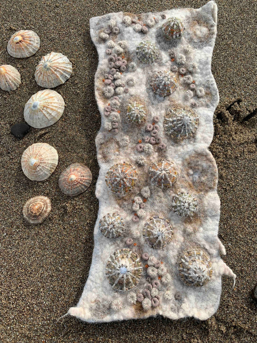 Wet felting workshop with Up and Down Dale felt artist Lynn Comley. Learn how to make a rock pool inspired textural wall hanging with hand embroidery.