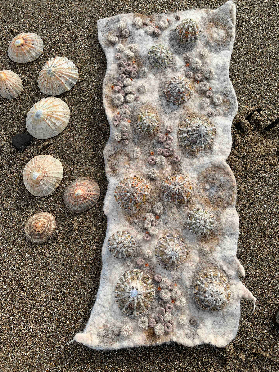 Wet felting workshop with Up and Down Dale felt artist Lynn Comley. Learn how to make a rock pool inspired textural wall hanging with hand embroidery.