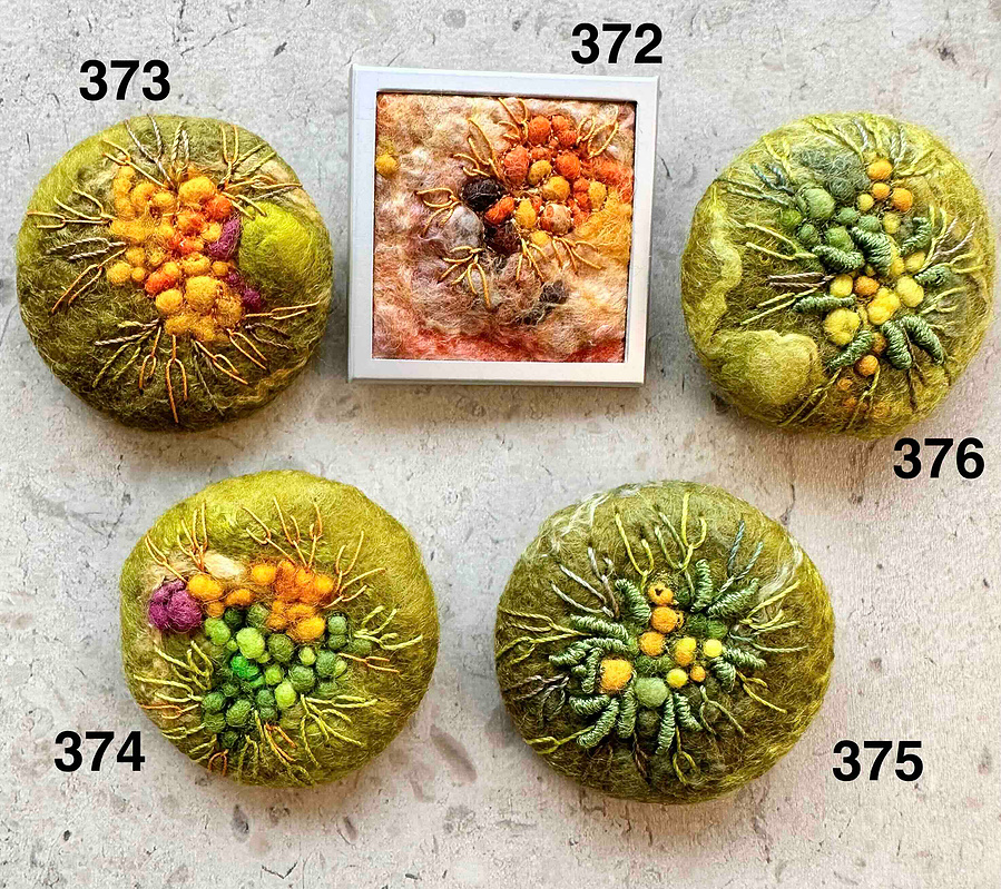 Moss and lichen embroidered brooches by Lynn Comley textile artist