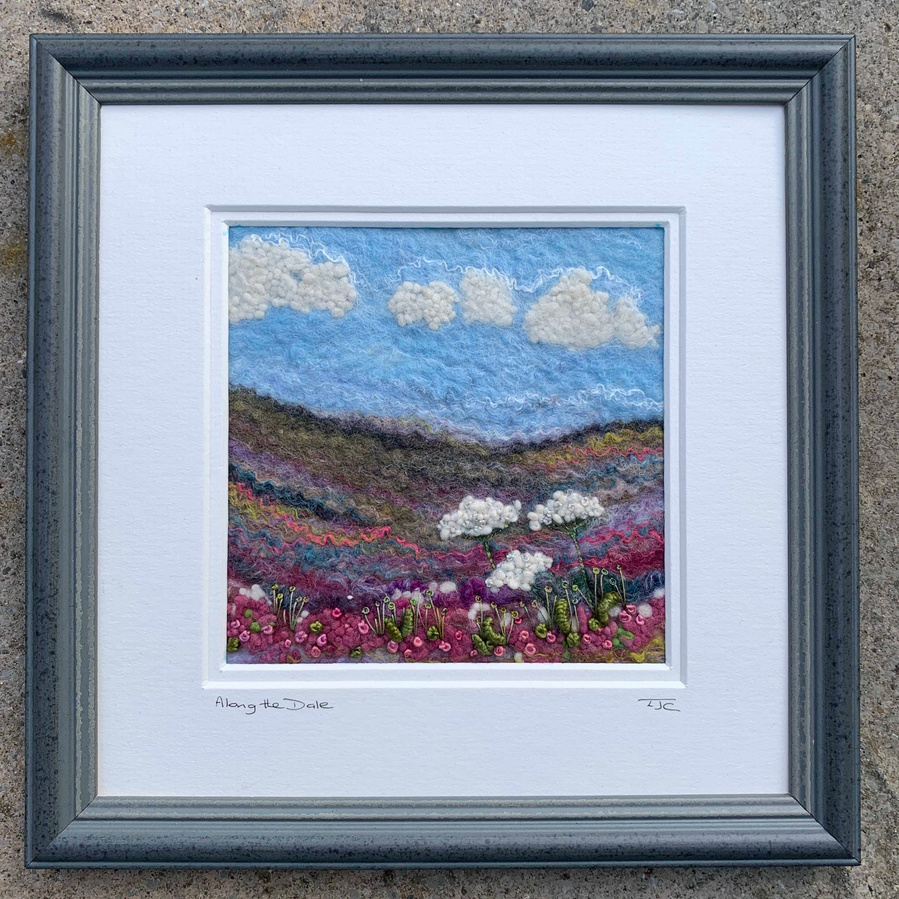 Framed original affordable art of Yorkshire British countryside, landscape picture depicting purple heather on the Yorkshire Dales moor. By York Textile artist Lynn Comley. Best British felt artists