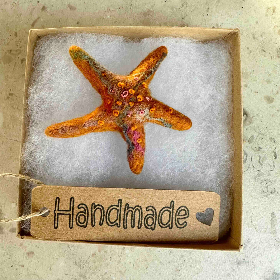 Starfish brooch wet felted and embroidered by Lynn Comley 
