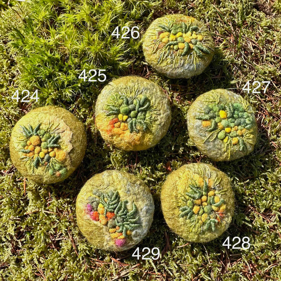 Moss and lichen embroidered brooches by Lynn Comley textile artist