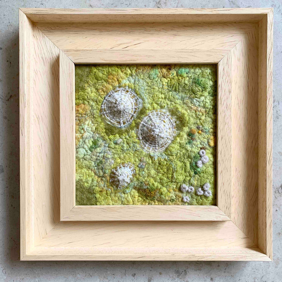 Wet felting textile artist Lynn Comley created limpet shells made entirely by wet felting wool with hand embroidery