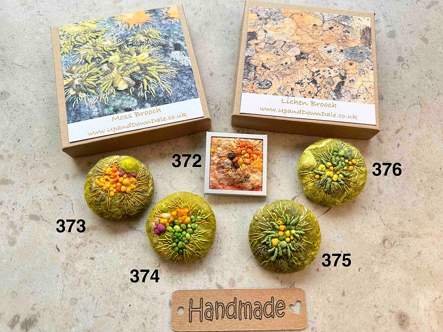 Moss and lichen embroidered brooches by Lynn Comley textile artist