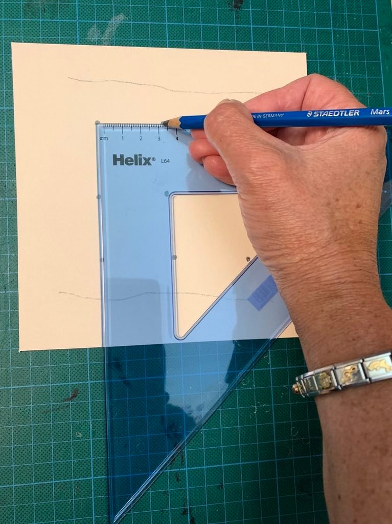 Use a set square and ruler to measure a grid