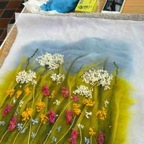 Lynn Comley at Scampston Hall Walled Garden workshop attendees work