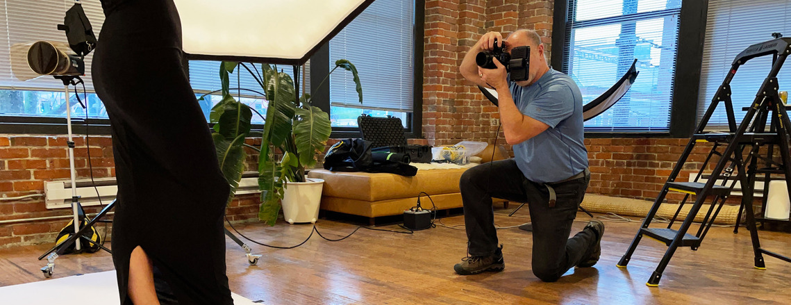 Portrait photographer Steve Keller at work in his studio