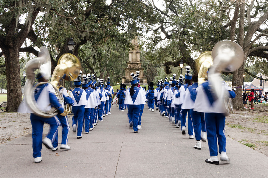 Savannah’s Blue Jackets march to their own beat as the inaugural performers for the the Savannah Philharmonic Festival, Forsyth Park, Savannah, GA,  October 2024 
