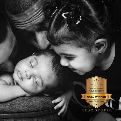 chaz studio Dubai photographer of the year 2022 award-winning photographer newborn photographer maternity photoshoot Abu Dhabi Sharjah Ajman al ain photographer wedding events emirates  pregnant couple Albums rates packages Photo Studio Near Me