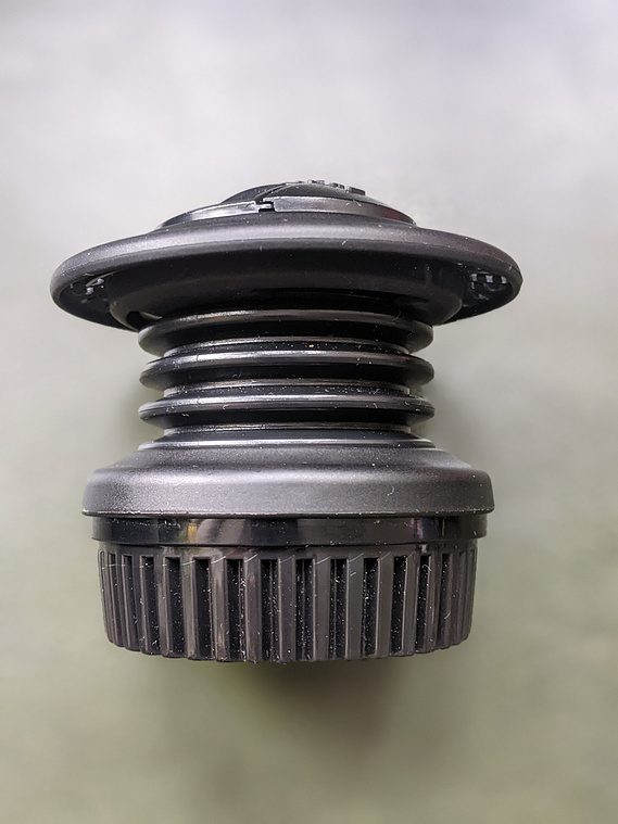 Side view of the Lensbaby Spark showing its plastic bellows