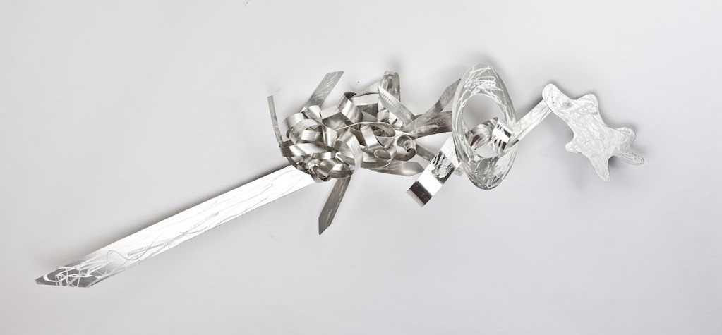 Dancing With My Fears-Abstract Art Piece With Various Shapes that Resembles Ties. The Ties are Bent in Various Ways. The Piece is Silver. 
