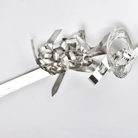 Dancing With My Fears-Abstract Art Piece With Various Shapes that Resembles Ties. The Ties are Bent in Various Ways. The Piece is Silver. 