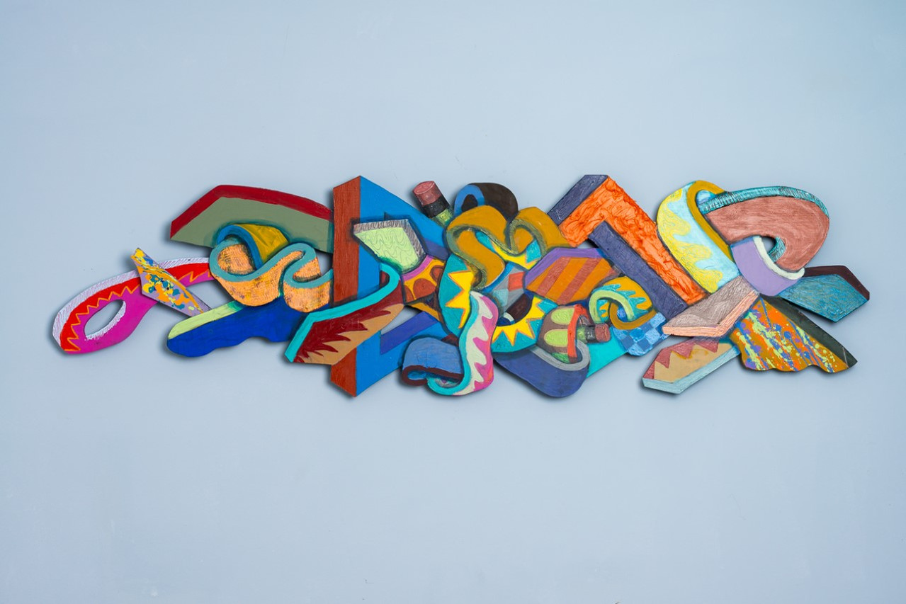 Unforseen Challenges-Multicolored Abstract Art Piece Hung on A Wall With Various Shapes that Resembles Ties. The Ties are Bent in Various Ways. 