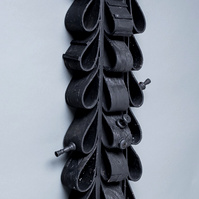 For Mike- Black Totem in the Shape of Ties.