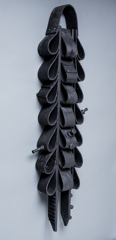For Mike- Black Totem in the Shape of Ties.