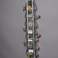 For Ornett Coleman- Silver Totem in the Shape of Ties.