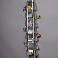 For Ornett Coleman- Silver Totem in the Shape of Ties.