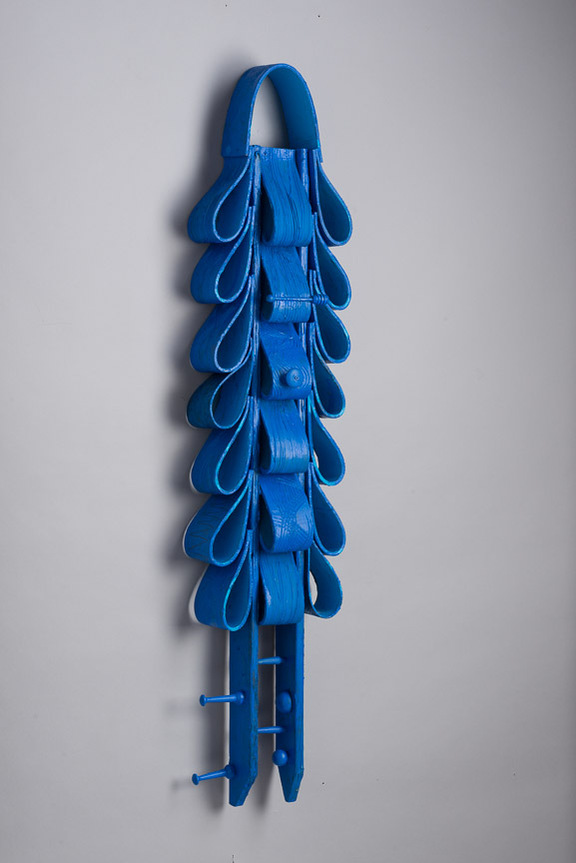 Bebe Medley-Totem in the Shape of Ties With Painted Blue.