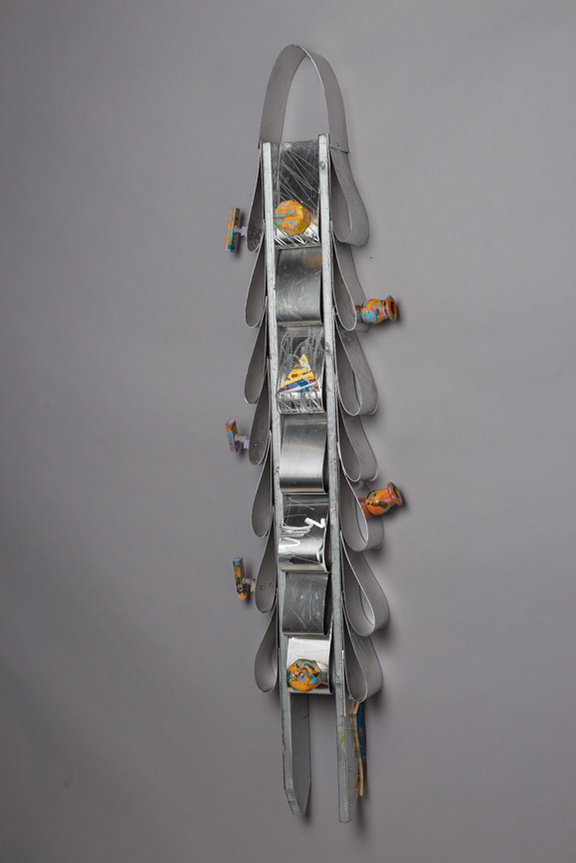 For Ornett Coleman- Silver Totem in the Shape of Ties.