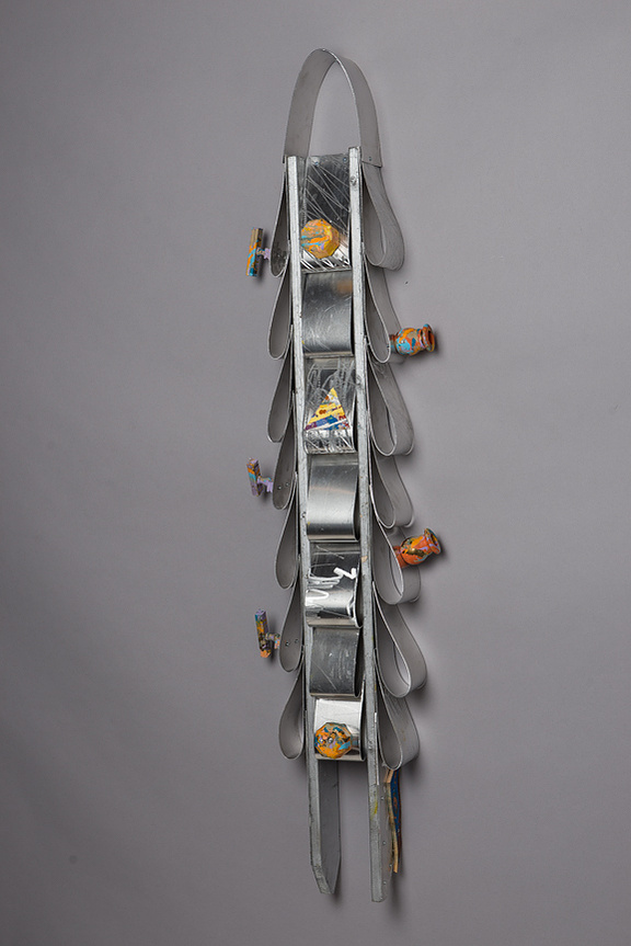 For Ornett Coleman- Silver Totem in the Shape of Ties.