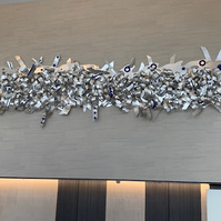 Henry Ford Cancer Center 66x387x11 Etched Aluminum  Detroit MI-Abstract Art Piece Made Of Aluminum Shapes That Resembles Ties.The Piece Is Silver.