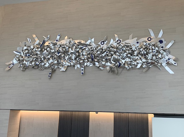 Henry Ford Cancer Center 66x387x11 Etched Aluminum  Detroit MI-Abstract Art Piece Made Of Aluminum Shapes That Resembles Ties.The Piece Is Silver.