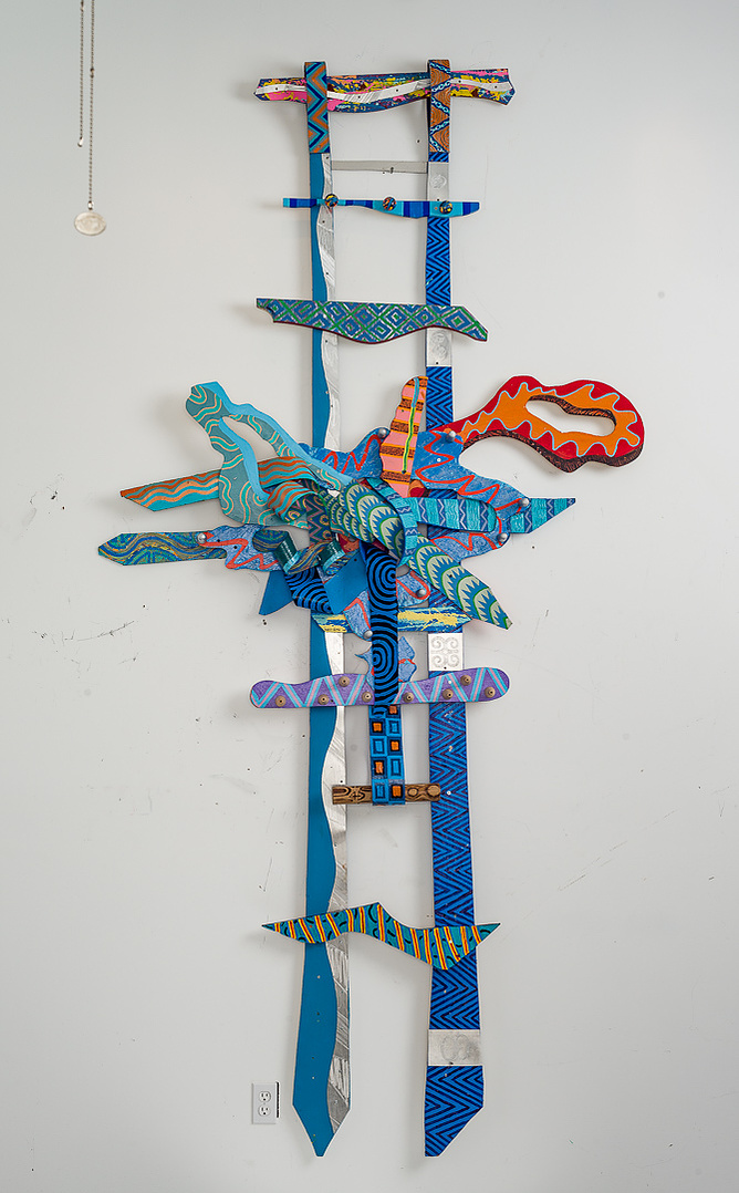 Hope and Determination - In The Collection Of Dr. Phillip Bowden, Atlanta, GA-Abstract art sculpture with multiple colors and shapes. The shapes are various and have tie shapes.This sculpture has cool colors.