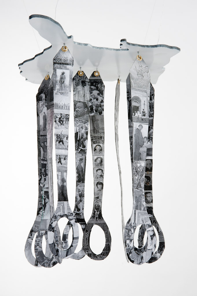 Colorless Dreams  II - Commission For The 50th Anniversary of the Freedom Riders, Alabama Historical Society-Abstract Art Piece With Spoons That Have a Hole in the Middle Hanging on A Piece of Material. The Piece Has People on the Handles of The Spoons. 