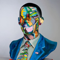 Mr. President Hear Our Cry - Commission For The Wright Museum in Detroit, MI-Multicolored Statue Figure of One Man's  Head and Shoulders. The Man is Dressed in a Jacket, Suit and Tie. 