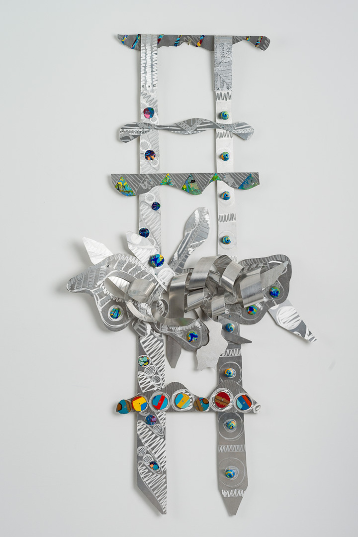 Seekin A Higher Ground III-Abstract Art Piece With Various Shapes that Resembles Ties. The Ties are Bent in Various Ways. The Piece is Silver With Small Color Detail. 