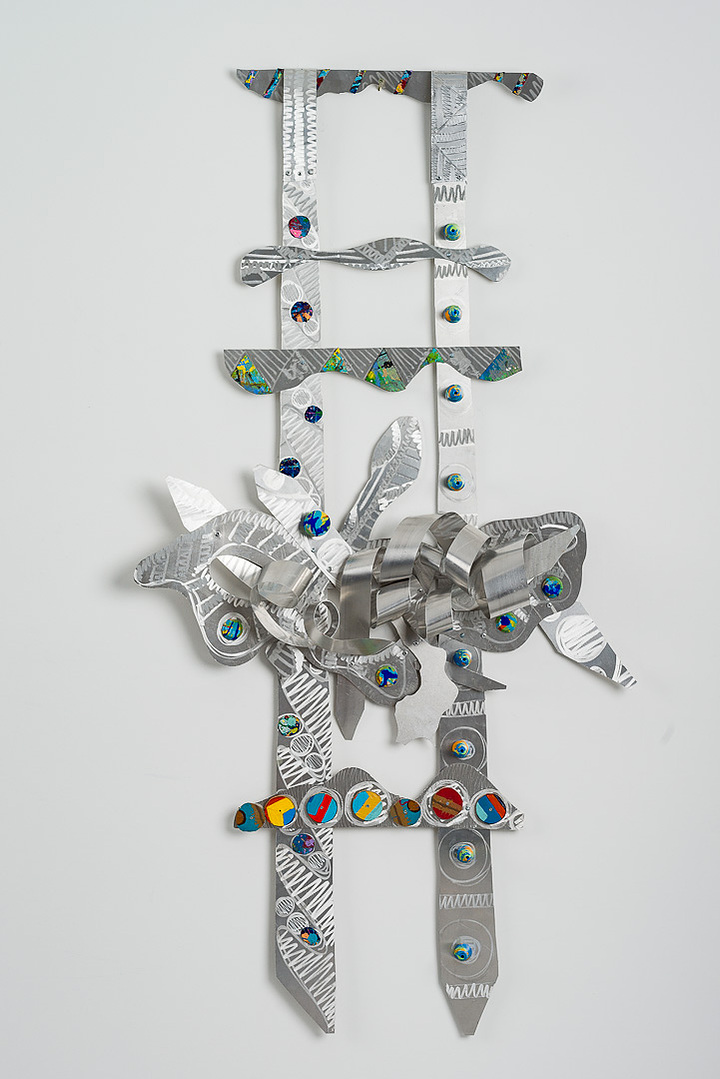 Seekin A Higher Ground III-Abstract Art Piece With Various Shapes that Resembles Ties. The Ties are Bent in Various Ways. The Piece is Silver With Small Color Detail. 