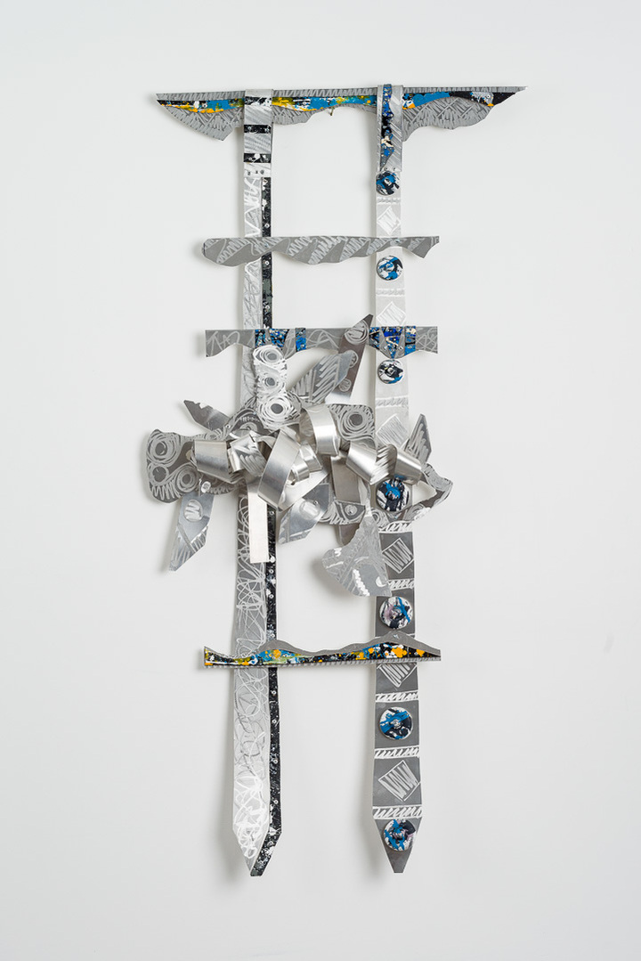 Seekin Higher Ground II Heaven-Abstract Art Piece With Various Shapes that Resembles Ties. The Ties are Bent in Various Ways. The Piece is Silver With Small Color Detail.