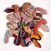 Monk Composition #19-Multicolored Abstract Art Piece Hung on A Wall With Various Shapes that Resembles Ties. The Ties are Bent in Various Ways. 