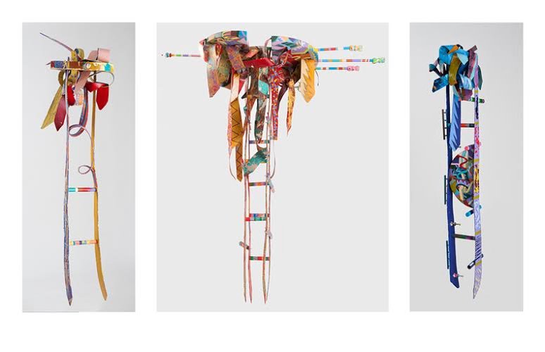Do Lord Remember Me- 3 Abstract Ladders With Abstract Ties On The Top. The Ladder and Ties Are Multicolored.