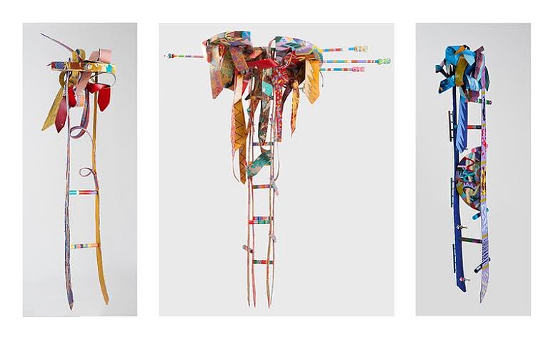 Do Lord Remember Me- 3 Abstract Ladders With Abstract Ties On The Top. The Ladder and Ties Are Multicolored.