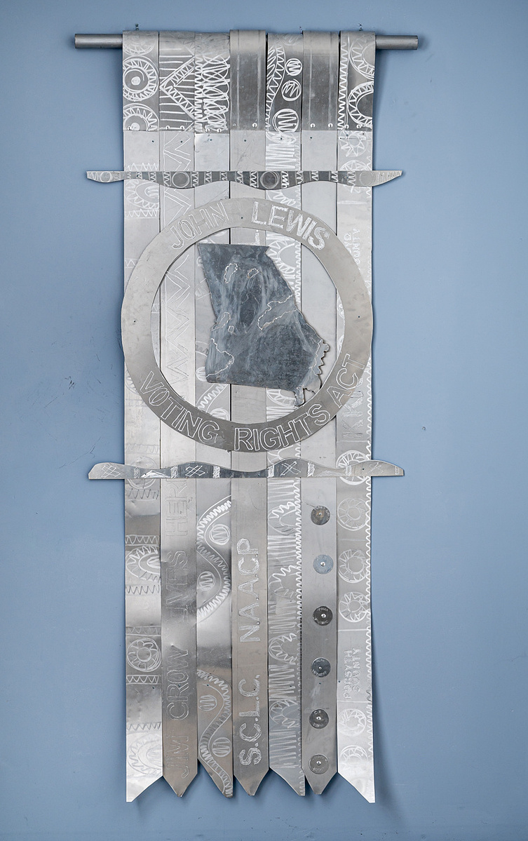  Swing State Georgia-Abstract Tie Art Piece With Several Straight Ties and The State Of Georgia Shape in the Middle. The Art Piece is Aluminum.